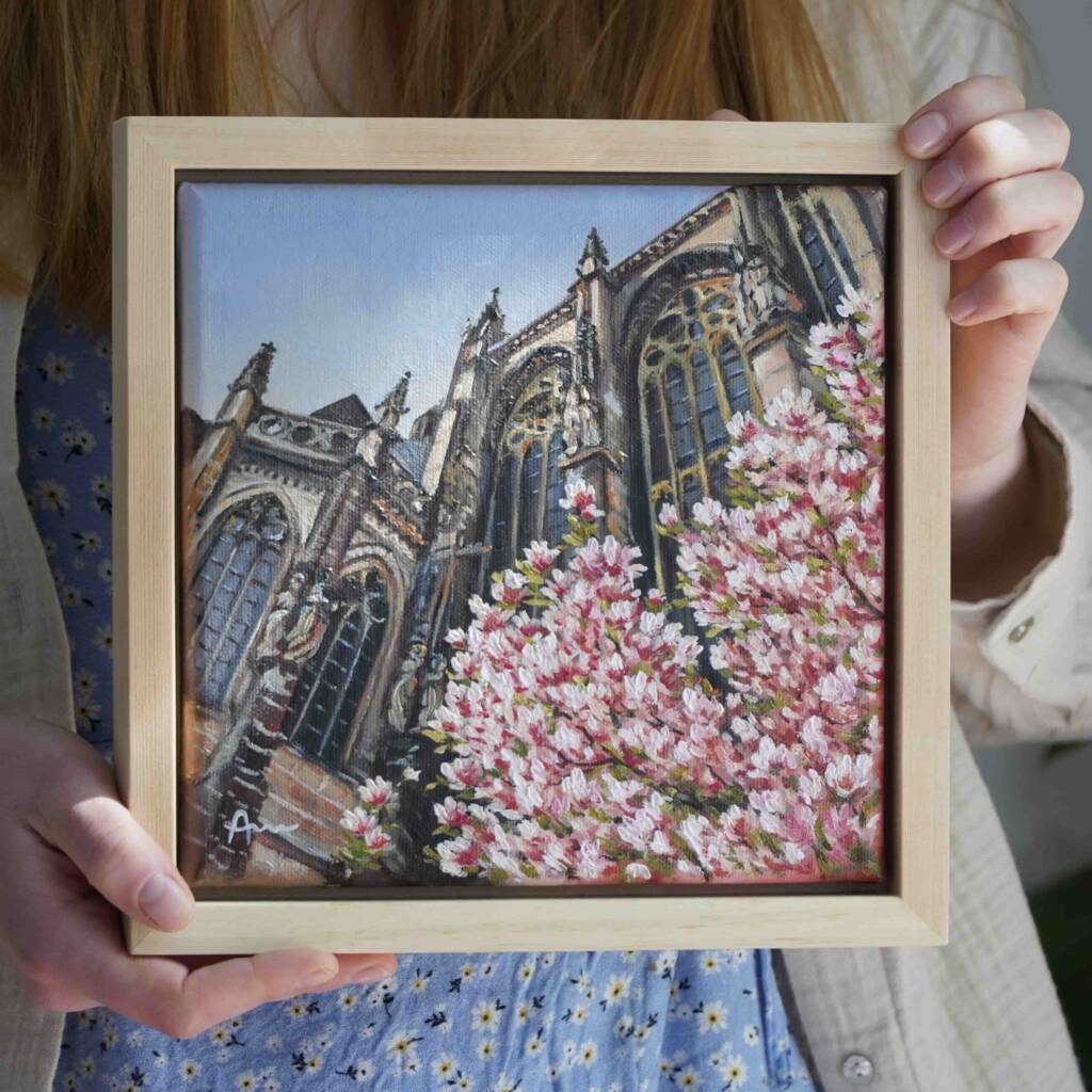 Original Ölgemälde des Aachener Doms mit blühenden Magnolienbäumen im Vordergrund, gemalt von der Aachener Künstlerin Ayleen Mertens – stimmungsvolles Aachen Gemälde zum Kunst kaufen.