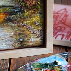 Detailbild von originalem Ölgemälde aus dem Aachener Stadtgarten mit Blick auf eine Brücke umgeben von herbstlichen Bäumen und einem Bach